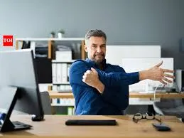 Person performing a seated shoulder stretch